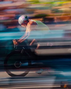 Cyclist at high speed with motion blur.